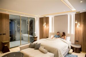 relaxed-young-lovers-luxurious-apartment-night